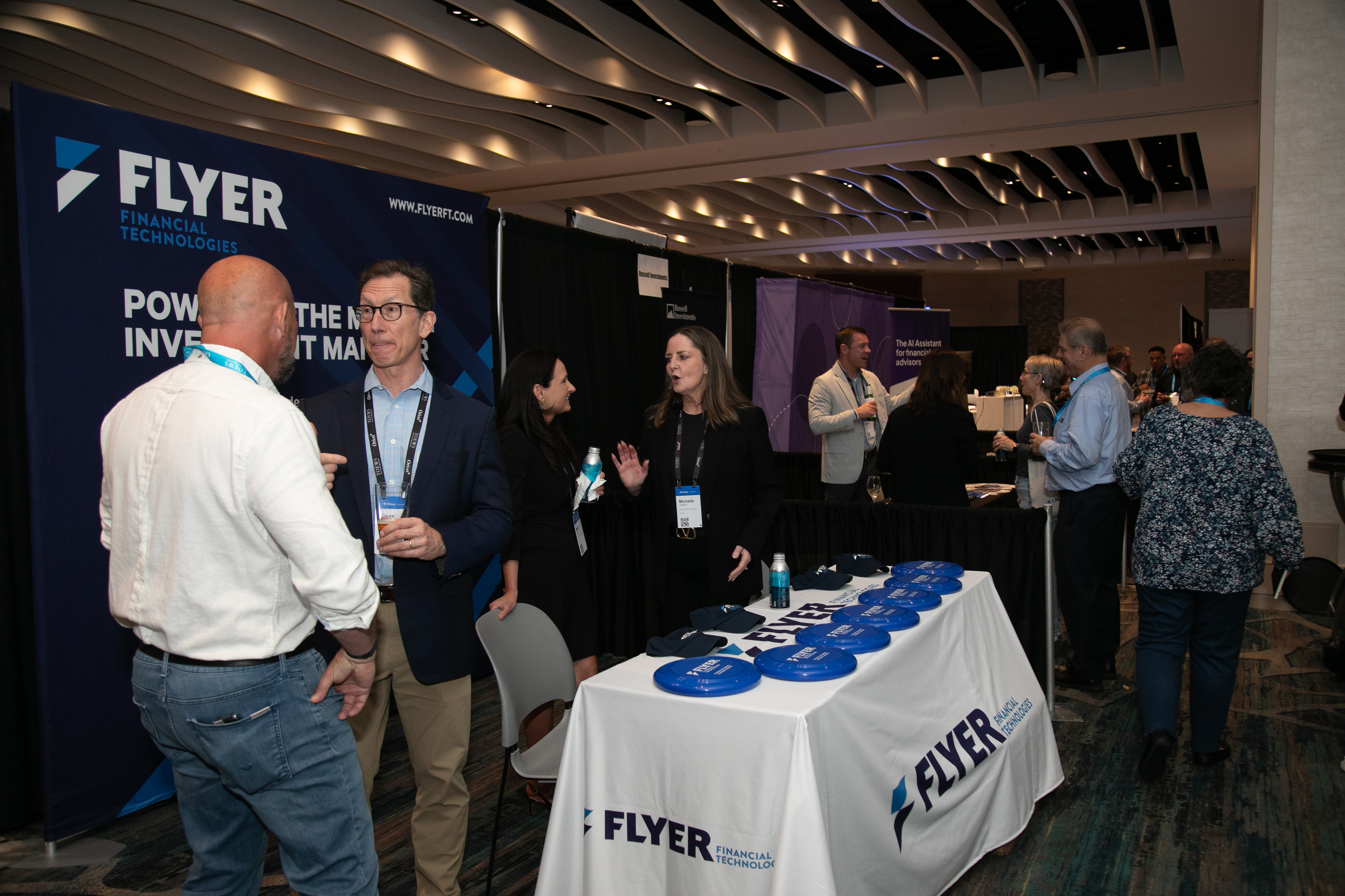 One-on-one conversation at a sponsor booth