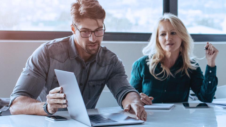 Advisor working with client.
