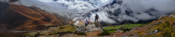 Active hikers enjoying a view of the Himalaya mountain landscape.