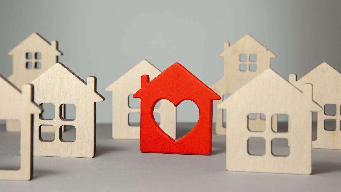 search-and-selection-of-homes-for-purchase-or-rent-many-house-and-one-red-with-heart