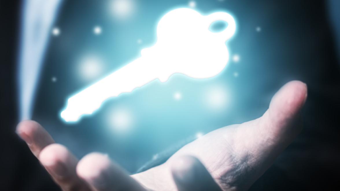 Businessman hand showing key to success. Problem solving to overcome work obstacles