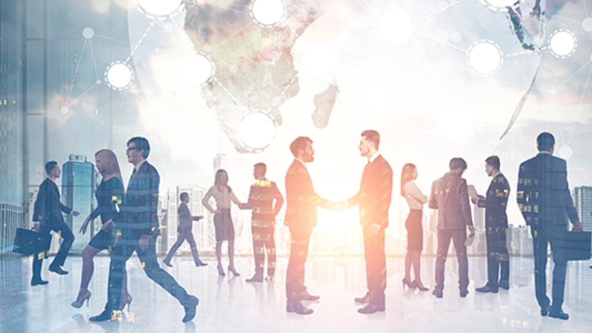 Business people silhouettes against a gray city sky with the Earth and a global network immersive interface. Toned image double exposure. Elements of this image furnished by NASA