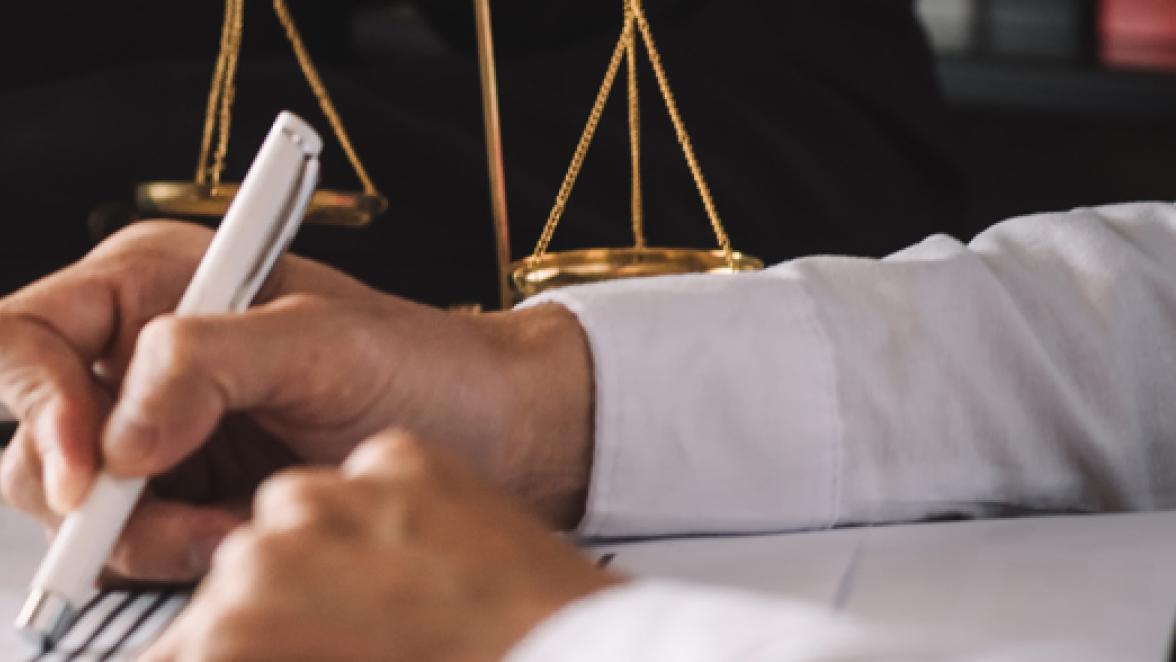 business-people-and-lawyers-discussing-contract-papers-sitting-a