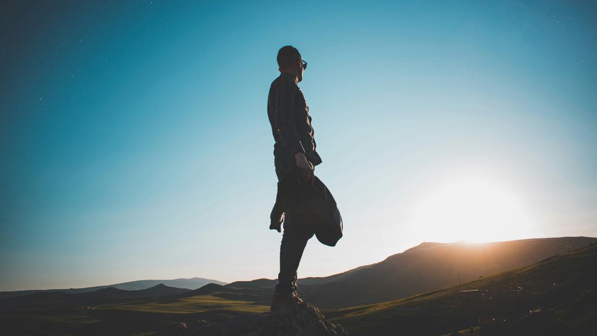 Man watching sunrise