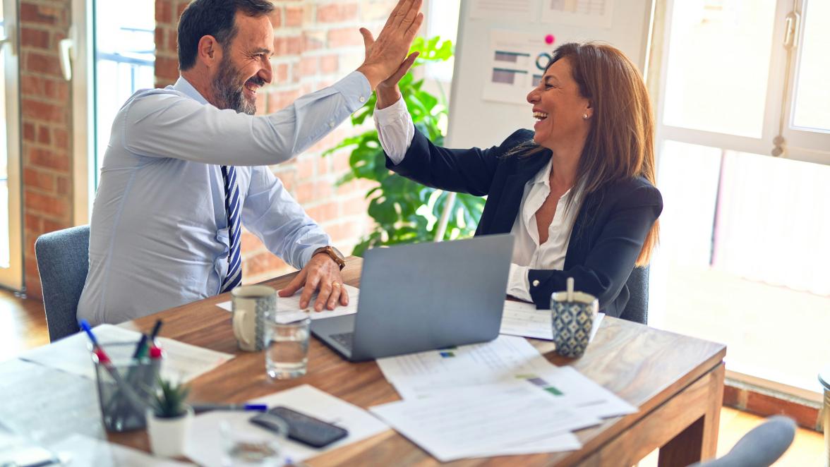 financial advisors high-fiving