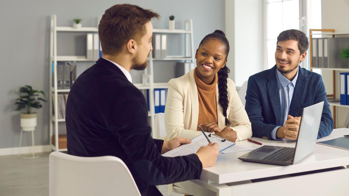 Financial advisor meeting with a couple