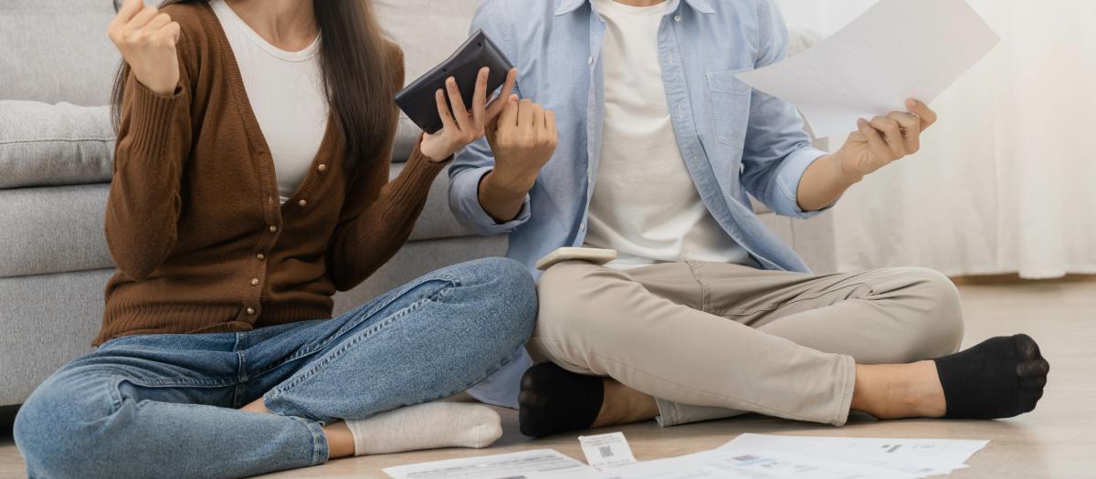 Happy couple celebrate tax refund