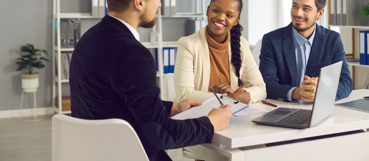 Financial advisor meeting with a couple