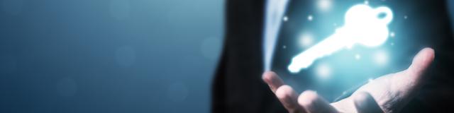 Businessman hand showing key to success. Problem solving to overcome work obstacles