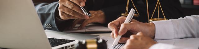 business-people-and-lawyers-discussing-contract-papers-sitting-a