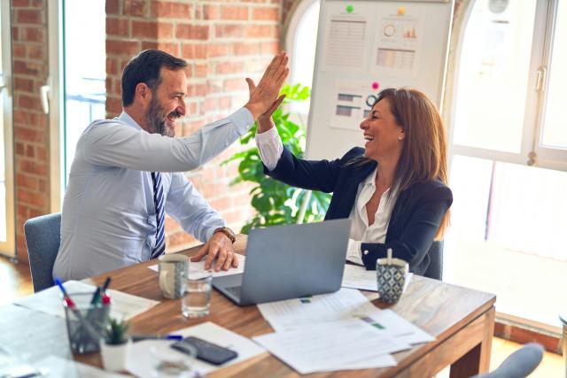 financial advisors high-fiving