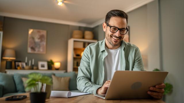 Man managing financial planning on his laptop