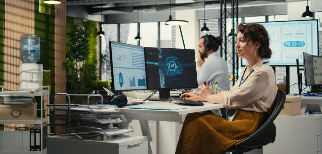 office works using AI on their computers