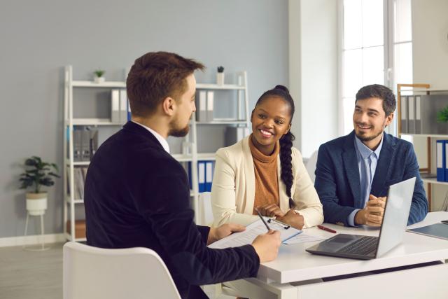 Financial advisor meeting with a couple