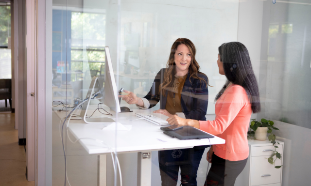 Women collaborating in office setting