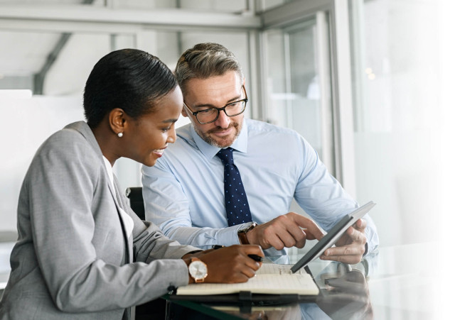 Two professionals filling the compliance gaps