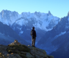Man looking at mountains